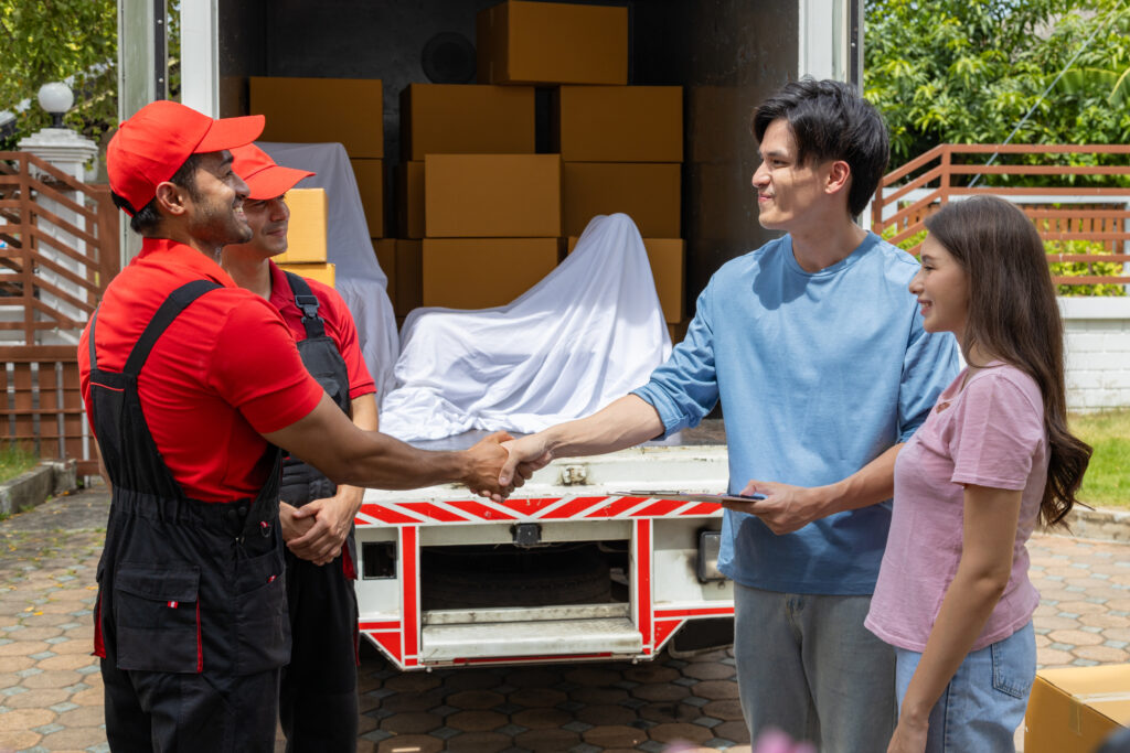 Couple checking references and reviews before hiring removalists in South Morang